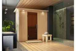 KARIBU Variado Sauna, Naturbelassen, Fichte, 210 X 132 X 202 Cm, Fronteinstieg, Mit Graphitfarbener Tür Und Kranz, SETmit Ofen 4,5 KW Integr. Str.